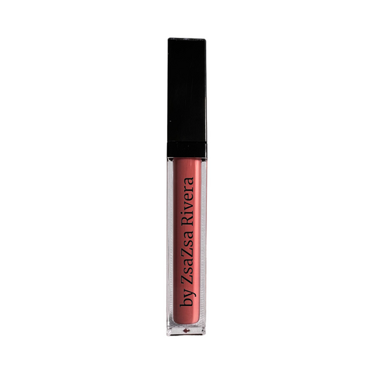 Close-up of a sleek tube of pink lip gloss with a shiny, glossy finish, perfect for adding a pop of color and shine to your lips.
