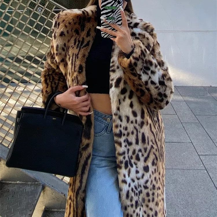 Luxurious Leopard Print Coat with high-quality faux fur, tailored fit, and eye-catching design, providing warmth and style for any occasion.