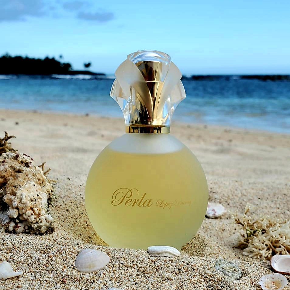 Perla López Baray Signature Scented Eau de Parfum Spray is a sheer floral-citrus bouquet with top notes of Mandarin and Lemon, middle notes of Freesia, Mimosa and Jasmine and bottom notes of Sandalwood and Oakmoss